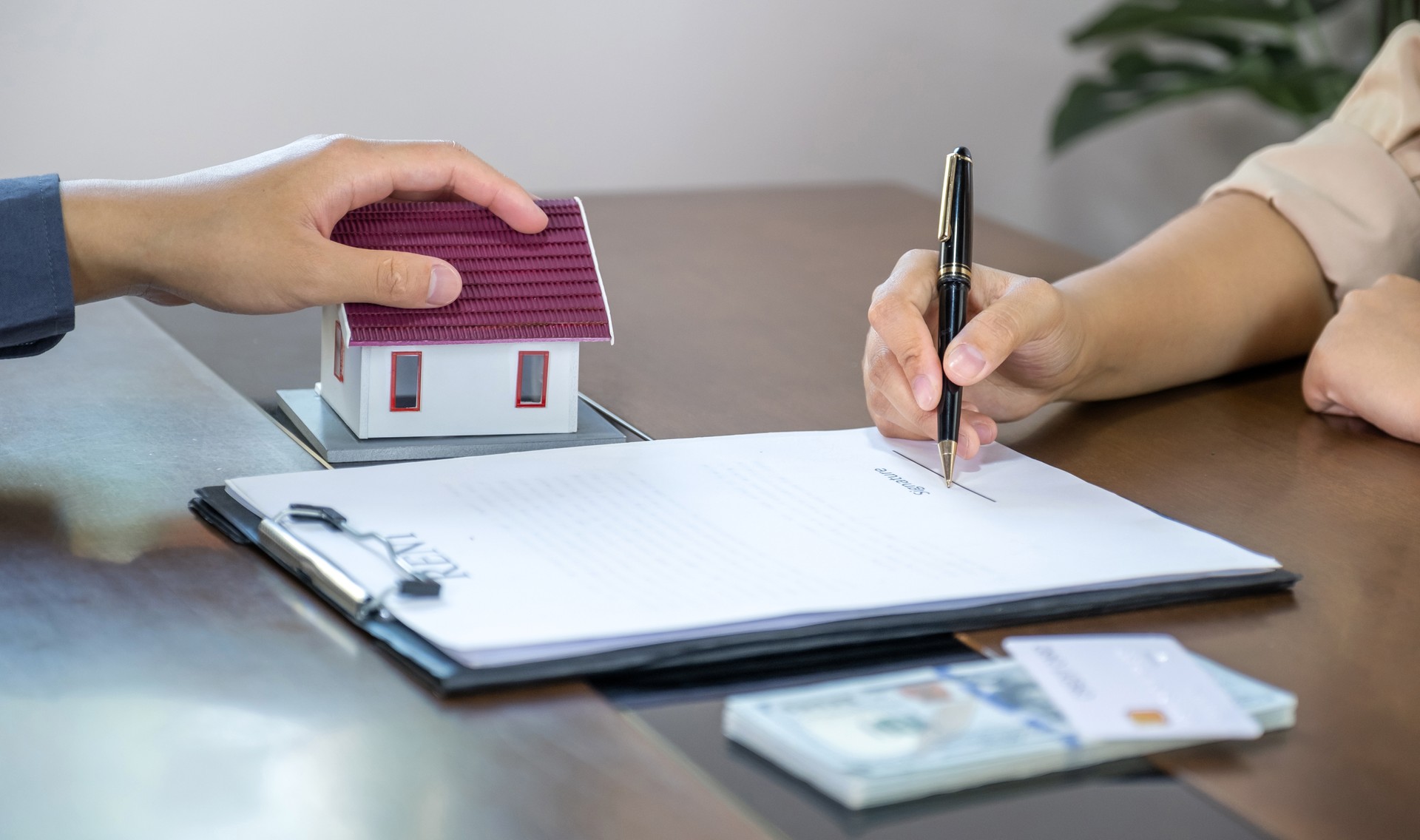 Real estate agents and buyers discuss signing a business contract, renting, buying, mortgage, loan or home insurance